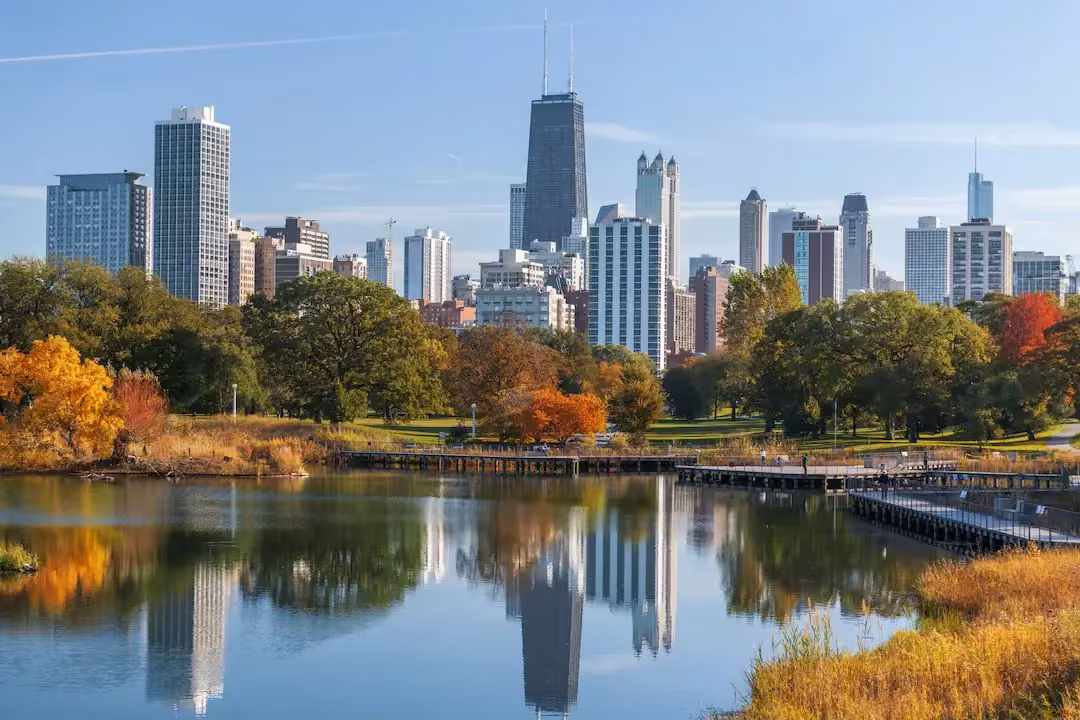 Chicago skyline reflected in the Lincoln Park lagoon in autumn