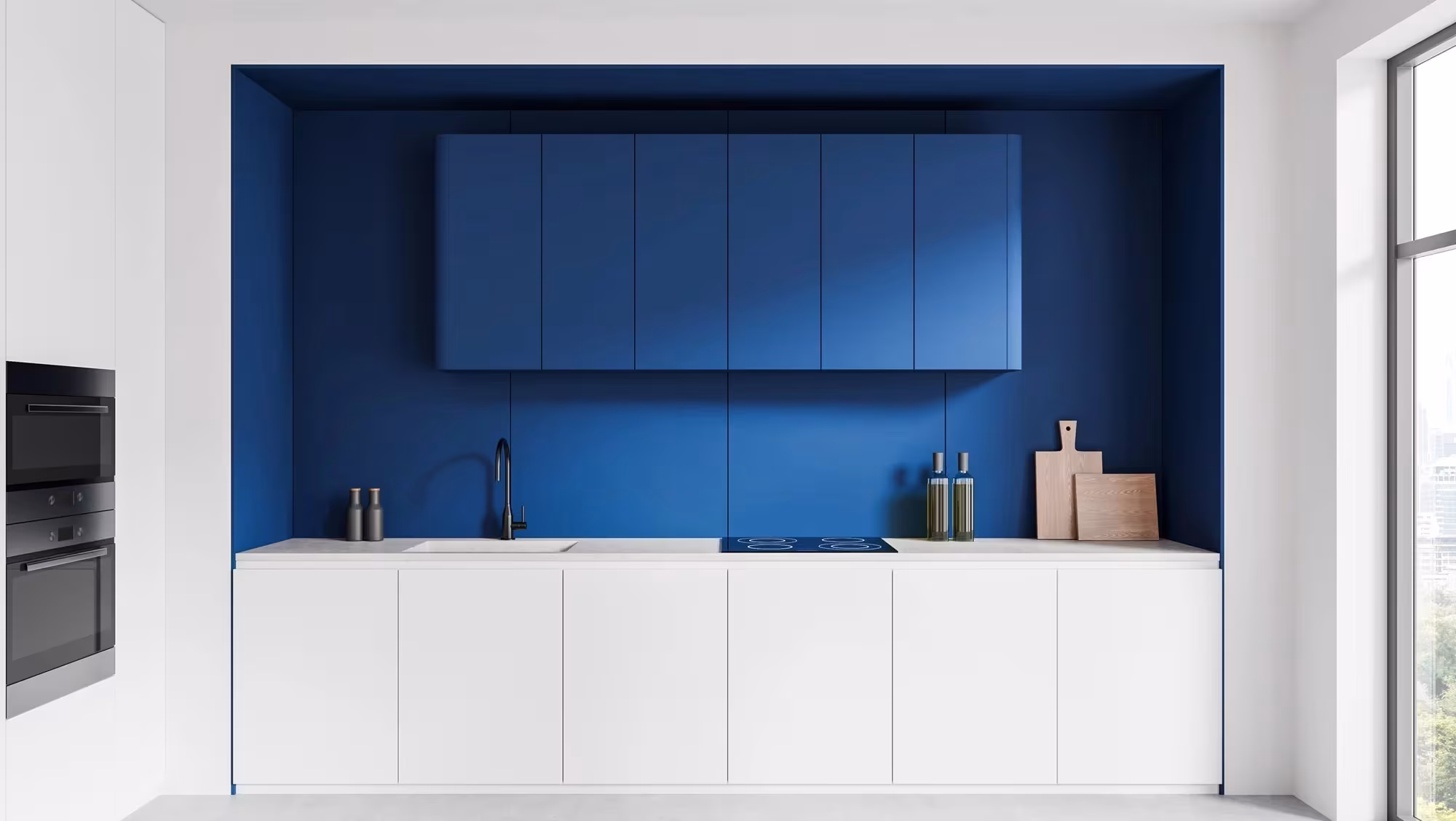 Blue upper cabinets above white handleless base units in Carol Stream