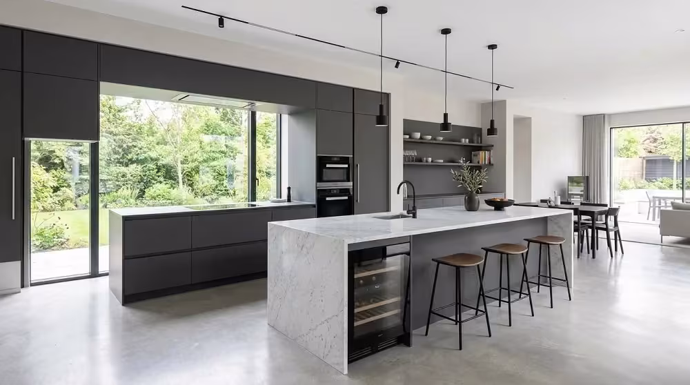 Black and white kitchen with an island and built-in wine cooler