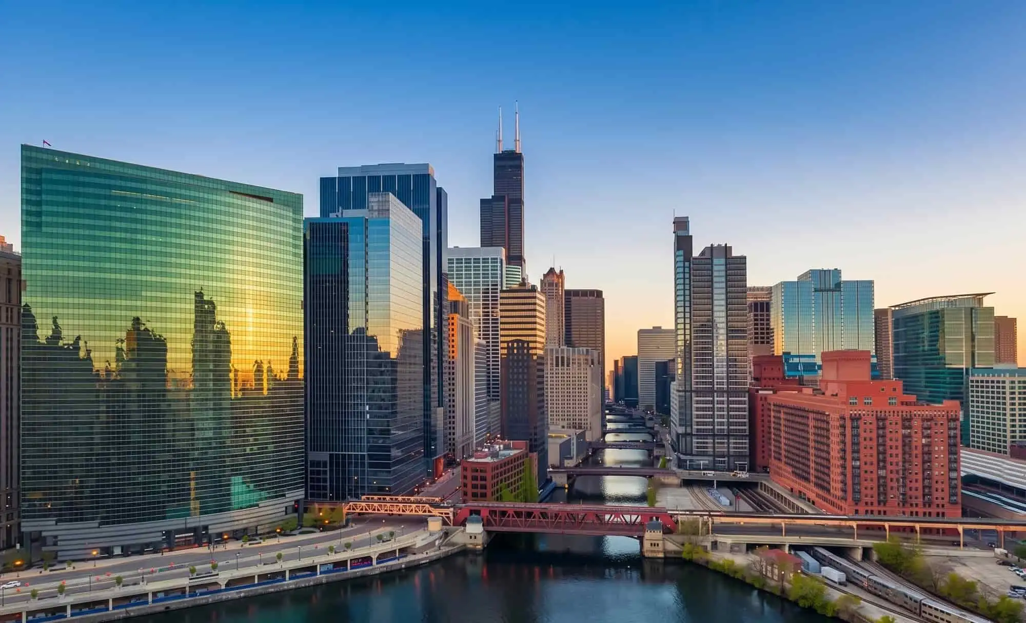 Chicago skyline and river at sunset above the Kitchen Cabinet Guys service areas