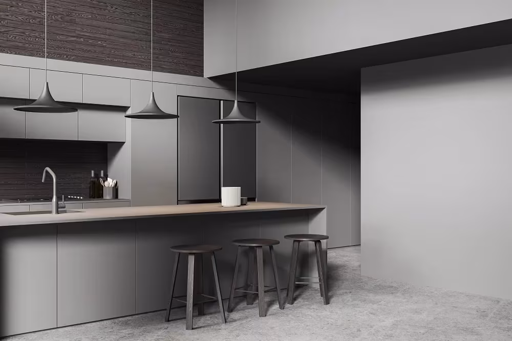 Dark greige handleless kitchen with a matching island