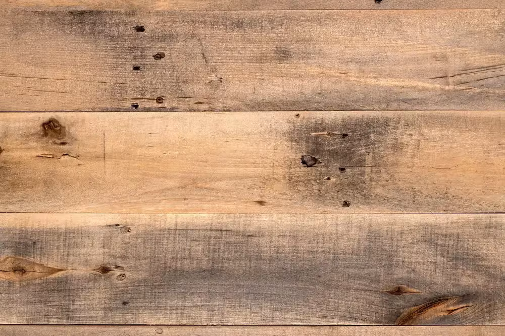 Weathered reclaimed wood planks used for cabinet fronts
