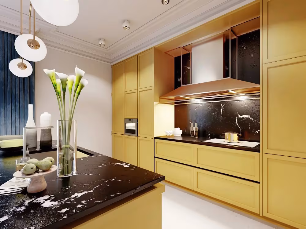 Mustard yellow cabinets beside a black stone island