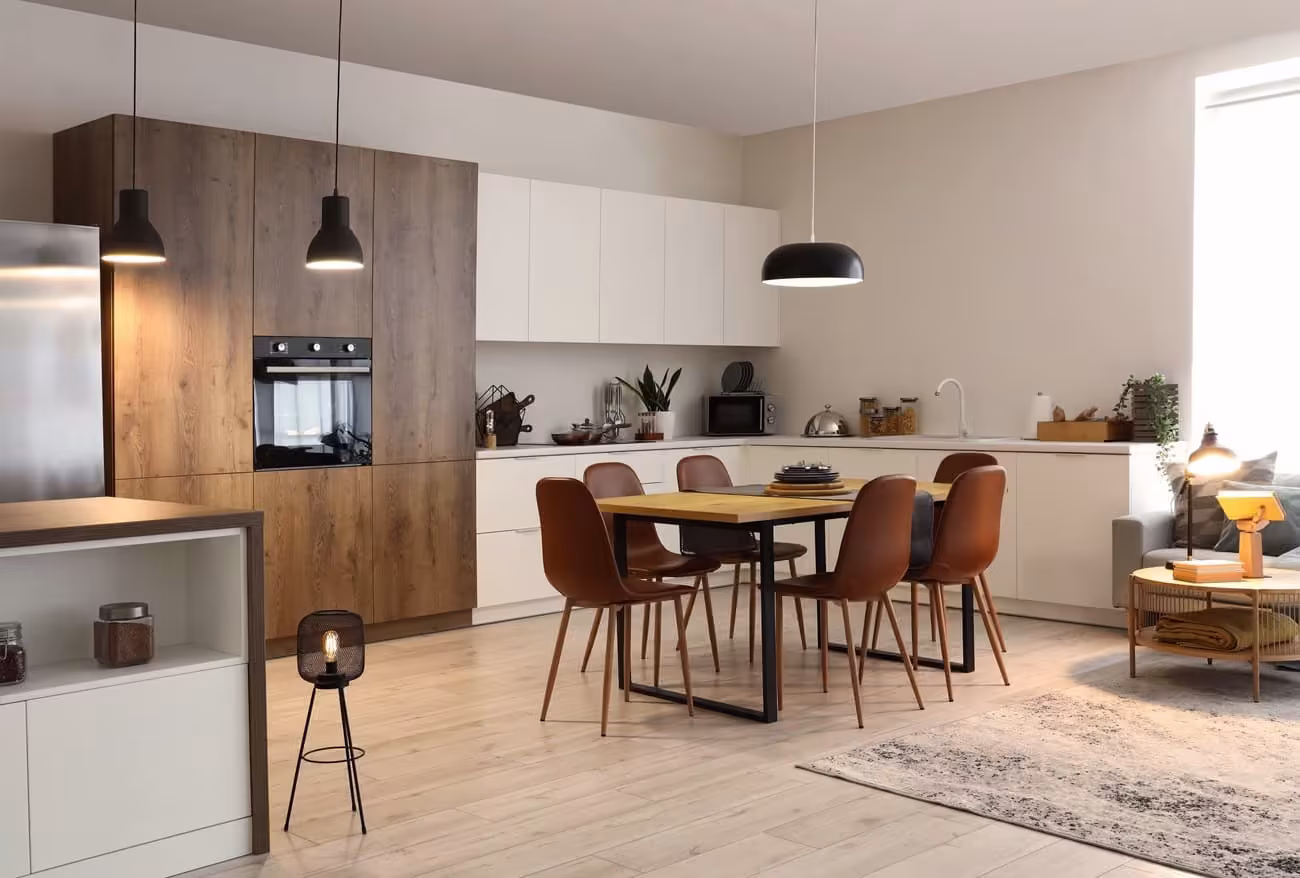 Open-plan kitchen and dining area with wood and white cabinets in Mount Prospect