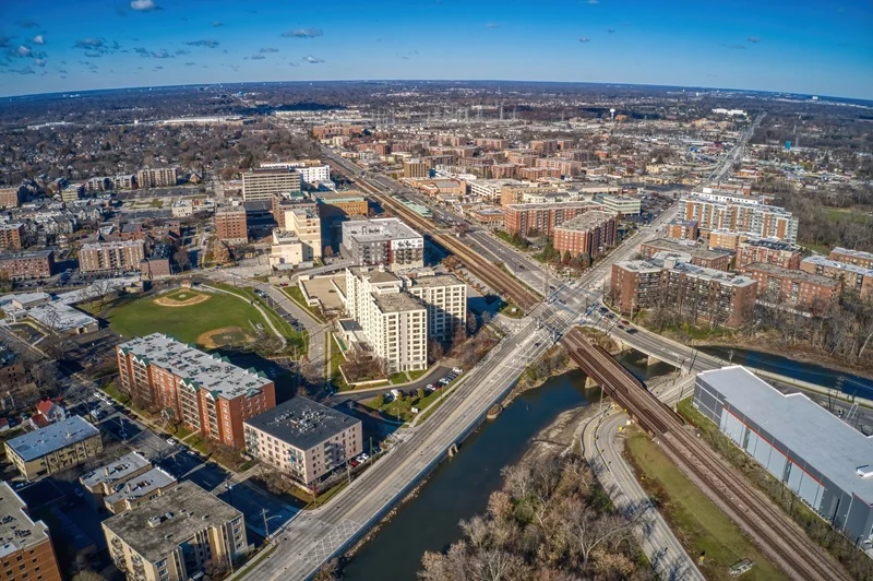 Aerial view of Des Plaines with the river, highway and apartment blocks